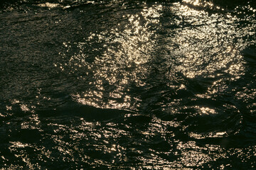 sun shining on the small river