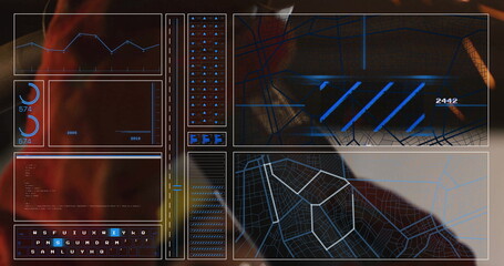 Hooded female operator analyzing data streams at high-tech console, with translucent HUD panels