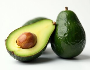 Fresh avocados cut and whole, great for healthy recipes and snacking