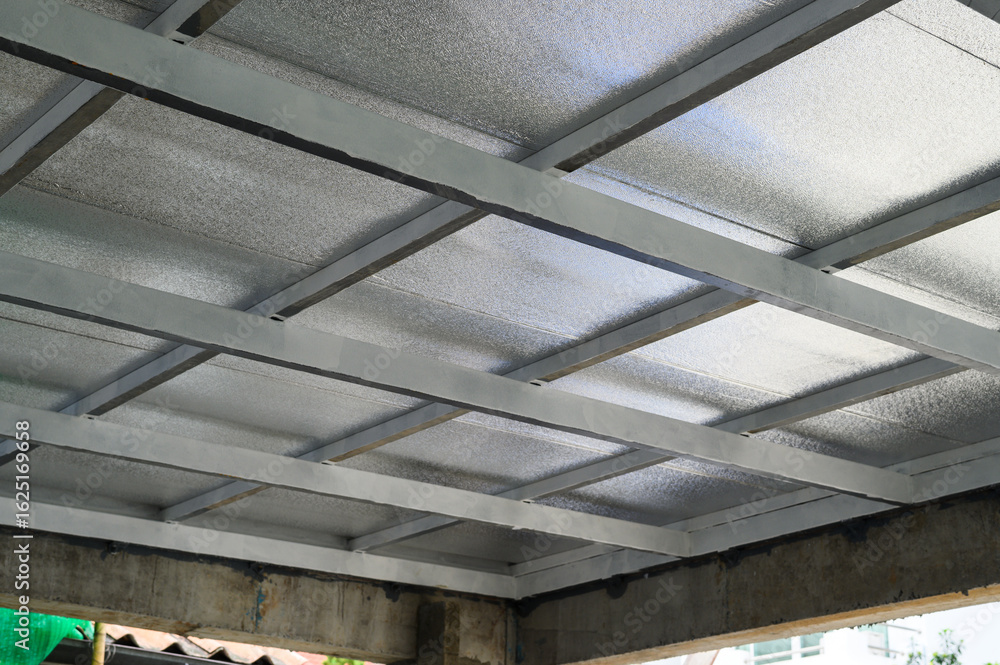 Poster gray metal beams form robust framework supporting large sheet panels possibly incorporating pu foam 