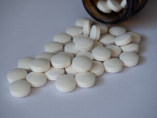 Pills on white background