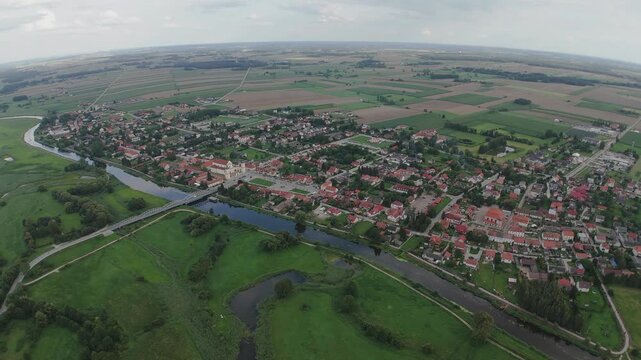 Drone circling over the picturesque, old town of Tykocin in Poland