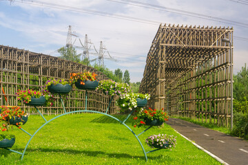 wooden galleries over the bike paths in the park, protects against possible falling wire of power lines