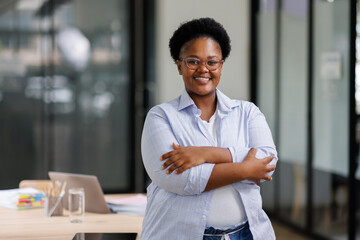 Cheerful African American Black woman in a studio shoot 