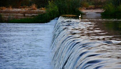 water flowing over the river