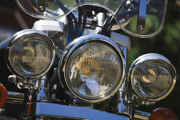 Detail on the headlight of a classic motorcycle
