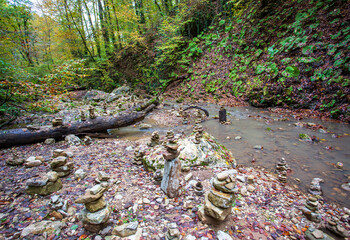 the spring period in nature, a shallow riverbed with a small flow of water