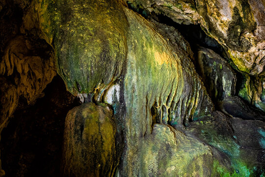 Dionysus or Dionisos cave for god of wine temple inside cavern rock formations walls by Iero beach on Ikaria island, Greece