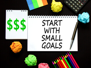 Start with small goals symbol. Concept words phrase Start with small goals on beautiful white note....