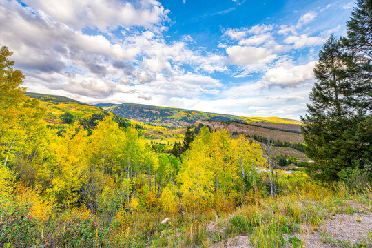 Autumn fall foliage colors near Minturn, Colorado of Eagle county mining town village, nature landscape view Highway 24 road scenic overlook