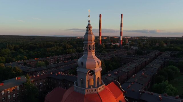 Aerial drone footage of Nikiszowiec, a historic red-brick miners' district in Katowice, Poland. Unique urban architecture, symmetry, and industrial heritage from the early 20th century.
