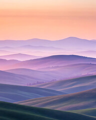 Rolling hills with pastel sunset sky, colorful landscape gradient, serene nature view, tranquil scenic countryside