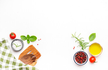 Food and cooking background, spices herbs, kitchen utensils, top view. Rose and black pepper, fresh...