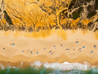 Gale Beach and Hoodoos Cliffs on Sunny Day. Atlantic Ocean, Portugal. Aerial Overhead High Angle...