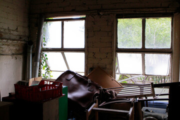 Cluttered Room with Natural Light and Urban Decay
