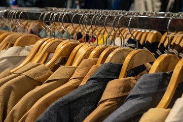 Obraz premium Men clothes hangers in a shop