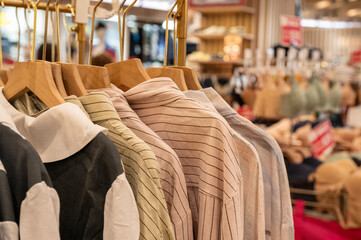 clothes on hangers in a shop