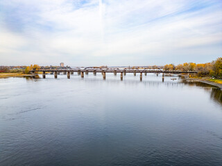 Drone photo showing a bridge connecting two urban areas in Montreal, capturing cityscape, infrastructure, and the surrounding environment from above.