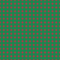seamless pattern with green polka dots on red background 