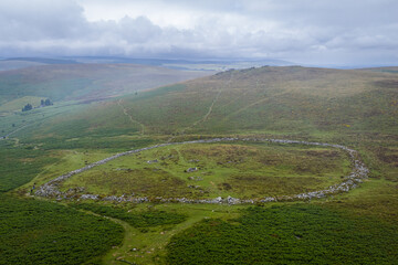 Aerial photo of Bronze Age settlement remains at Grimespound, Dartmoor, showing circular enclosures...
