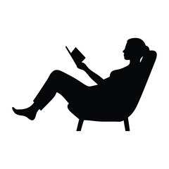 Silhouette of a woman relaxing and reading a book