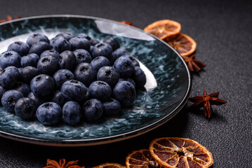 Fresh juicy blueberries, healthy vegan food with vitamins and minerals. Blueberries berry