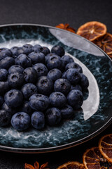 Fresh juicy blueberries, healthy vegan food with vitamins and minerals. Blueberries berry