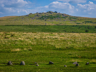 Aerial view of Bronze Age stone rows and settlement remains at Merrivale, Dartmoor, surrounded by...