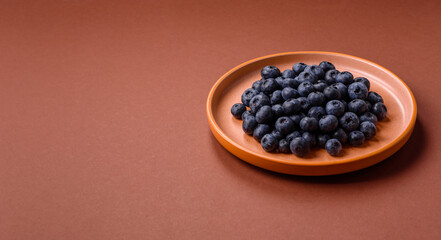 Fresh juicy blueberries, healthy vegan food with vitamins and minerals. Blueberries berry