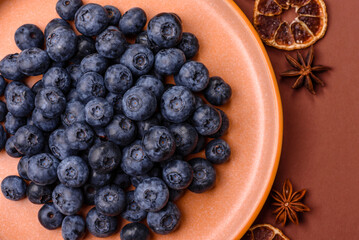 Fresh juicy blueberries, healthy vegan food with vitamins and minerals. Blueberries berry