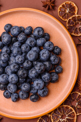 Fresh juicy blueberries, healthy vegan food with vitamins and minerals. Blueberries berry
