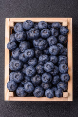 Fresh juicy blueberries, healthy vegan food with vitamins and minerals. Blueberries berry