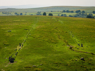 Aerial view of Bronze Age stone rows and settlement remains at Merrivale, Dartmoor, surrounded by...