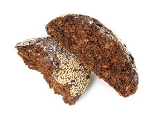 Pieces of fresh rye bread with seeds isolated on white, above view