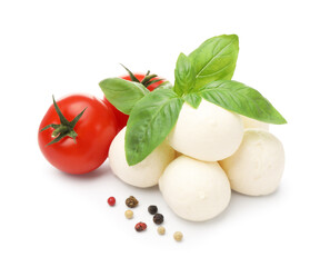 Tasty mozzarella cheese balls, tomatoes, basil and peppercorns isolated on white