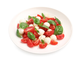 Tasty salad Caprese with mozzarella, tomatoes, basil and spices isolated on white
