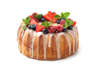 Delicious bundt cake with berries, glaze and mint isolated on white