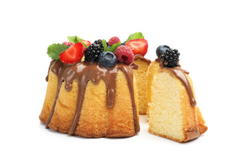 Tasty Bundt cake with berries, chocolate and mint isolated on white