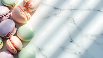 “Flat lay of assorted colorful macarons arranged neatly on a marble surface, pastel tones, soft daylight from the side, elegant and minimalistic food styling.”