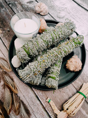 Artemisia absinthium dried herb smudging bundle on altar. Herbal medicine, artemisia bundle, dried...