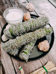 Artemisia absinthium dried herb smudging bundle on altar. Herbal medicine, artemisia bundle, dried...