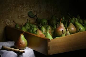 Still life with pears in a box