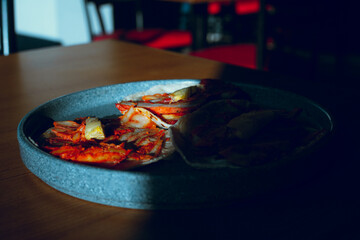 Mexican food. Steak tacos in a restaurant with dramatic lighting and retro or vintage inspiration.