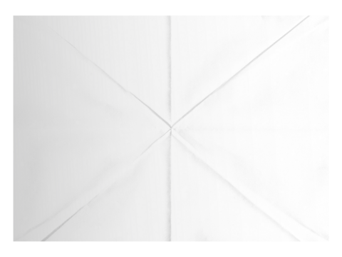 Crisp white paper unfolded with precise diagonal creases creating a clean, modern design element for creative projects
