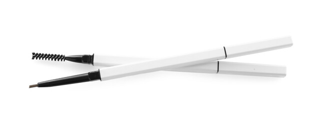 Two twist up eyebrow pencils isolated on white, top view