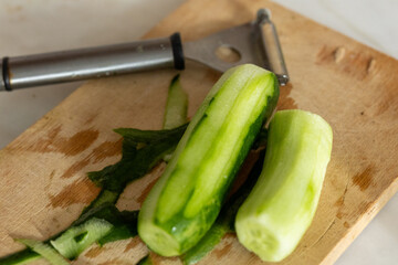 sliced cucumber on a cutting board