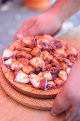 The Most Famous Dish from Galicia Pulpo a Feira. Concept A celebrated regional specialty.