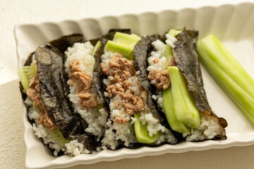 Homemade sushi taco recipe with tuna in close-up