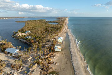 Destroyed houses on ocean coast. Hurricane Milton consequences in Englewood, Florida. Storm surge...