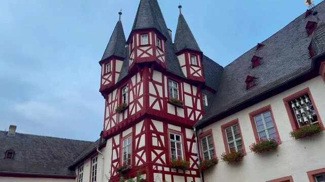 Rheingau Wine Region, Hesse. Wine Tourism. A Walk Through the Narrow Old Streets of Rudesheim am Rhein, Germany August 20, 2024. High quality 4k footage